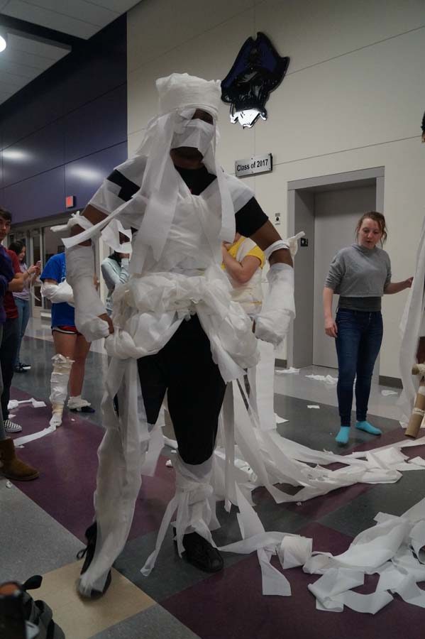 Senior Michael Brown and his team create a ninja princess costume form toilet paper and masking tape. After the judging the ninja princess and gladiator fought each other for the toilet paper costumes.