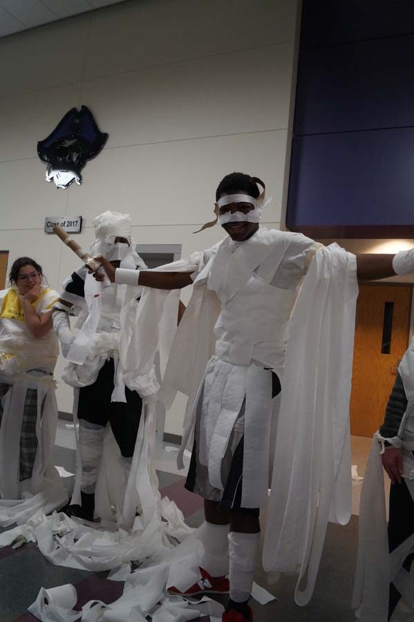 Senior Marcus Wallace and his team make Marcacus a gladiator costume from toilet paper and masking tape. They also won part of the contest.