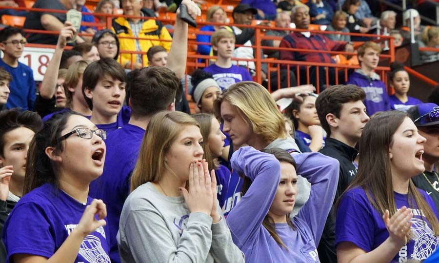 In the last minute of the game the crowd erupts in a last attempt at saving the game while waiting in angst of the final outcome. Seniors Nicole Acosta, Mary Rodgers, Aubree Knetter, and Kara Evans try to rally our student section and team for a strong end to the State game on March 8.