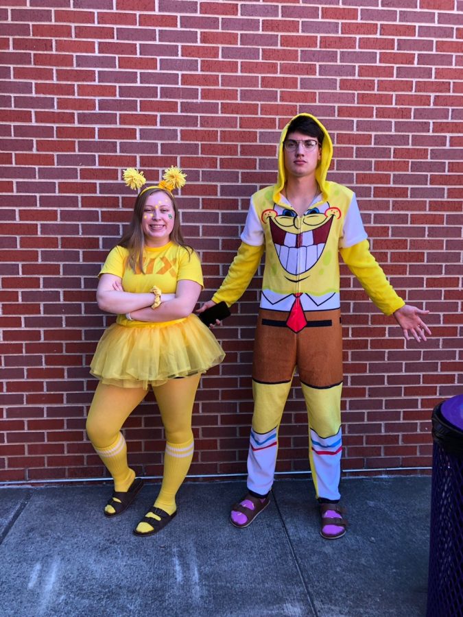 Seniors Eryn Cox and Rene Evans wear yellow for Galaxy Wars Day.