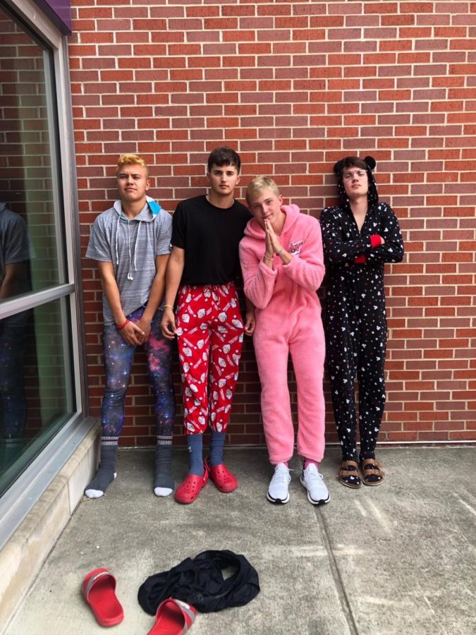 Seniors Gabe Eskina, Tyren Shelley, Rene Evans, and sophomore Aiden Price wear pajamas for Space Jammies Day. 