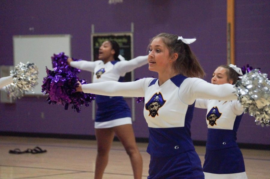 Junior Sydnee Pippert begins the Fight Song during practice November 5.