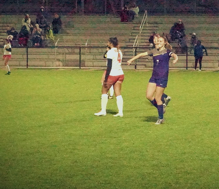 Senior, Emma Hawley scores goal and gives her teammates a slight celebration, putting Piper up 8-2.