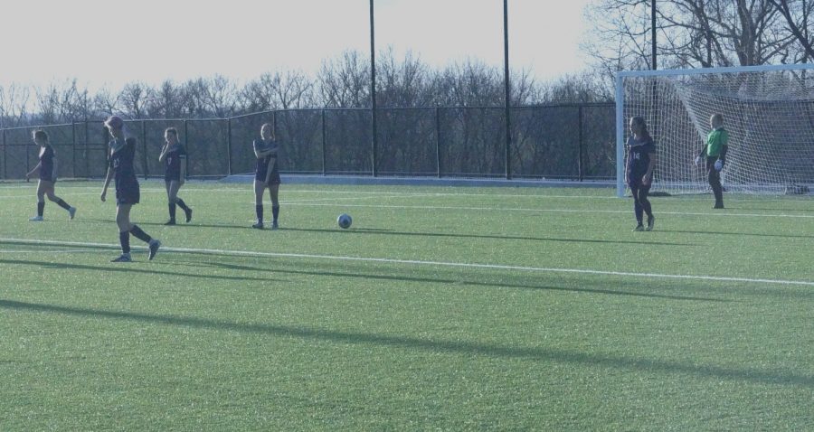 The girls varsity soccer team prepares to face their opponent, the Bonner Springs Braves. 