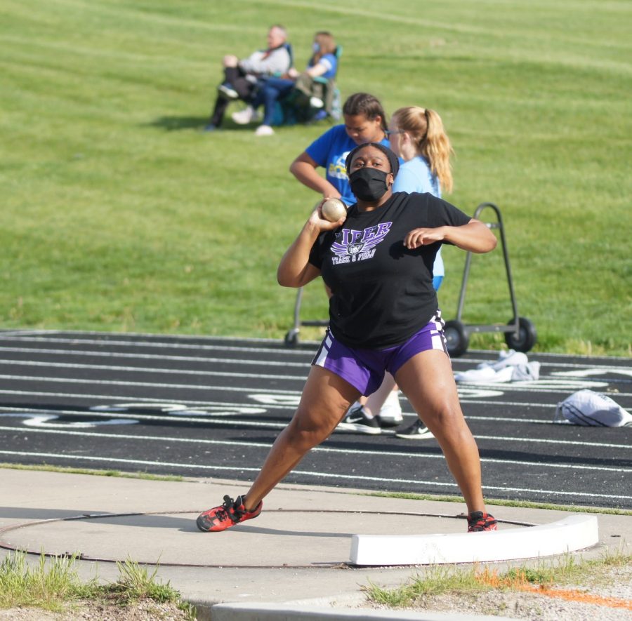 Sophomore Amaya Lawal throws in shot put Wednesday, May 5 at the Piper High School Invitational. Throwing 28.9 meters, Lawal placed 6th overall.